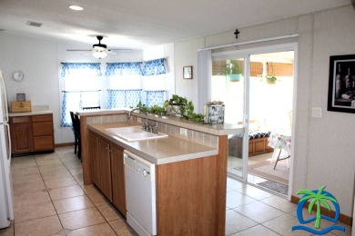**Charming Waterfront Retreat in Florida!** NEW ROOF 2025! on Cypresswood Golf and Country Club in Florida - for sale on GolfHomes.com, golf home, golf lot