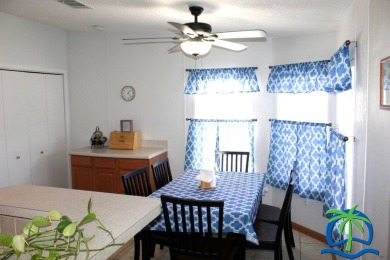 **Charming Waterfront Retreat in Florida!** NEW ROOF 2025! on Cypresswood Golf and Country Club in Florida - for sale on GolfHomes.com, golf home, golf lot