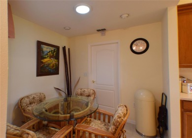 Enjoy golf course frontage in this beautifully maintained on Tampa Bay Golf and Country Club in Florida - for sale on GolfHomes.com, golf home, golf lot