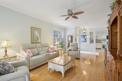 Meticulously maintained and lovingly cared for, rare end-unit on Pelican Pointe Golf and Country Club in Florida - for sale on GolfHomes.com, golf home, golf lot