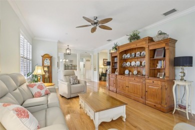 Meticulously maintained and lovingly cared for, rare end-unit on Pelican Pointe Golf and Country Club in Florida - for sale on GolfHomes.com, golf home, golf lot