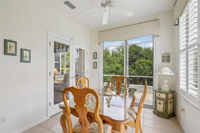 Meticulously maintained and lovingly cared for, rare end-unit on Pelican Pointe Golf and Country Club in Florida - for sale on GolfHomes.com, golf home, golf lot