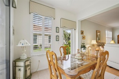 Meticulously maintained and lovingly cared for, rare end-unit on Pelican Pointe Golf and Country Club in Florida - for sale on GolfHomes.com, golf home, golf lot