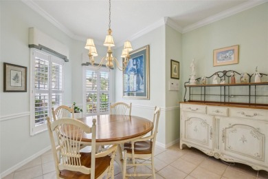 Meticulously maintained and lovingly cared for, rare end-unit on Pelican Pointe Golf and Country Club in Florida - for sale on GolfHomes.com, golf home, golf lot