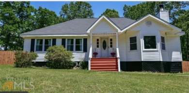 Don't miss this updated country home! Large covered back porch on Chestatee Golf Club in Georgia - for sale on GolfHomes.com, golf home, golf lot