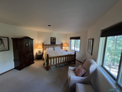Take a look at this unique octagon home with easy year round on Pendaries Village Community Assoc. in New Mexico - for sale on GolfHomes.com, golf home, golf lot