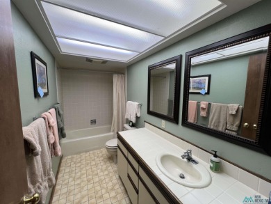 Take a look at this unique octagon home with easy year round on Pendaries Village Community Assoc. in New Mexico - for sale on GolfHomes.com, golf home, golf lot