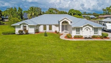 Located in The Much Sought After Sandpiper Bay Community on The Saints At Port St Lucie Golf Course in Florida - for sale on GolfHomes.com, golf home, golf lot