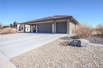 Welcome to this beautifully maintained 4-bedroom, 2-bath home in on Adobe Creek National Golf Course in Colorado - for sale on GolfHomes.com, golf home, golf lot