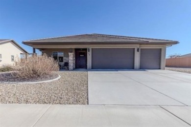 Welcome to this beautifully maintained 4-bedroom, 2-bath home in on Adobe Creek National Golf Course in Colorado - for sale on GolfHomes.com, golf home, golf lot