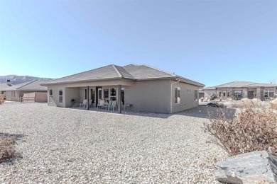 Welcome to this beautifully maintained 4-bedroom, 2-bath home in on Adobe Creek National Golf Course in Colorado - for sale on GolfHomes.com, golf home, golf lot