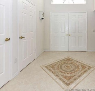 Located in The Much Sought After Sandpiper Bay Community on The Saints At Port St Lucie Golf Course in Florida - for sale on GolfHomes.com, golf home, golf lot