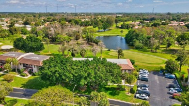 Nestled in a picturesque gated community, this magnificent on Boca Lago Golf and Country Club in Florida - for sale on GolfHomes.com, golf home, golf lot