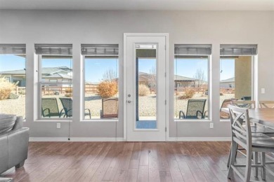 Welcome to this beautifully maintained 4-bedroom, 2-bath home in on Adobe Creek National Golf Course in Colorado - for sale on GolfHomes.com, golf home, golf lot