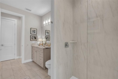 This exceptional residence, situated on the 13th hole of Twin on Twin Isles Country Club in Florida - for sale on GolfHomes.com, golf home, golf lot