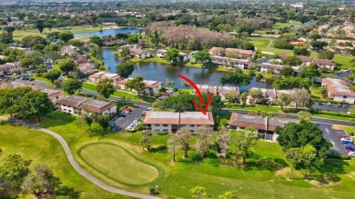 Nestled in a picturesque gated community, this magnificent on Boca Lago Golf and Country Club in Florida - for sale on GolfHomes.com, golf home, golf lot