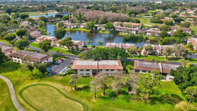 Nestled in a picturesque gated community, this magnificent on Boca Lago Golf and Country Club in Florida - for sale on GolfHomes.com, golf home, golf lot