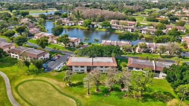 Nestled in a picturesque gated community, this magnificent on Boca Lago Golf and Country Club in Florida - for sale on GolfHomes.com, golf home, golf lot