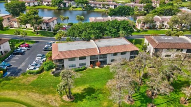 Nestled in a picturesque gated community, this magnificent on Boca Lago Golf and Country Club in Florida - for sale on GolfHomes.com, golf home, golf lot