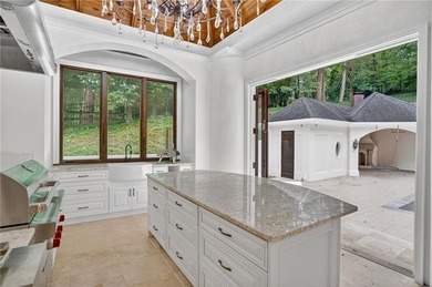 Stunning European-inspired estate nestled on a private, gated on Bobby Jones Golf Club in Georgia - for sale on GolfHomes.com, golf home, golf lot