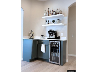 This beautifully updated 4-bedroom, 3-bathroom home at 3749 on  in Wyoming - for sale on GolfHomes.com, golf home, golf lot