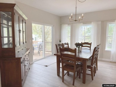 This beautifully updated 4-bedroom, 3-bathroom home at 3749 on  in Wyoming - for sale on GolfHomes.com, golf home, golf lot