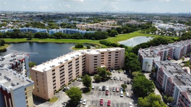 1BR/1BA condo on Fontainebleau Blvd. 5th floor unit with tile on Fontainebleau Golf Course in Florida - for sale on GolfHomes.com, golf home, golf lot