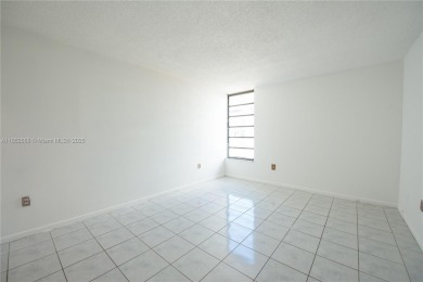 1BR/1BA condo on Fontainebleau Blvd. 5th floor unit with tile on Fontainebleau Golf Course in Florida - for sale on GolfHomes.com, golf home, golf lot
