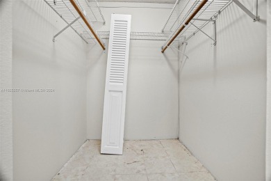 Two-bedroom, two-bathroom condominium. HOA Includes water, trash on Pembroke Lakes Golf Club in Florida - for sale on GolfHomes.com, golf home, golf lot