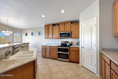 WOW NEW PRICE! Nestled within Estrella, this open & bright on Estrella Mountain Ranch Golf Course in Arizona - for sale on GolfHomes.com, golf home, golf lot