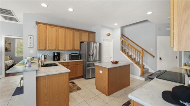 Luxurious 6 Bed, 4 Bath Pool and Spa Lake Access Dream-home on The Groves Golf and Country Club in Florida - for sale on GolfHomes.com, golf home, golf lot