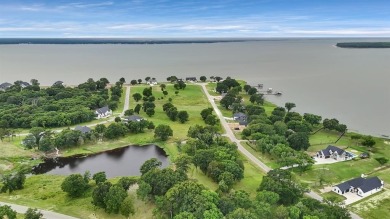 Experience the luxurious lake living this community offers! This on Cedar Creek Country Club in Texas - for sale on GolfHomes.com, golf home, golf lot