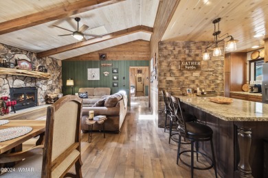 Charming single-level cabin in Pinetop Country Club, offering 1 on Pinetop Lakes Country Club in Arizona - for sale on GolfHomes.com, golf home, golf lot