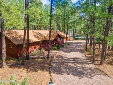 Charming single-level cabin in Pinetop Country Club, offering 1 on Pinetop Lakes Country Club in Arizona - for sale on GolfHomes.com, golf home, golf lot