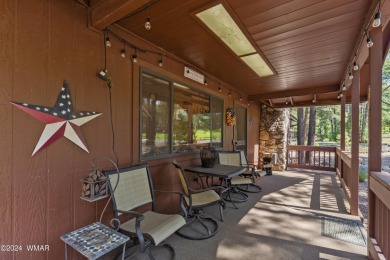 Charming single-level cabin in Pinetop Country Club, offering 1 on Pinetop Lakes Country Club in Arizona - for sale on GolfHomes.com, golf home, golf lot