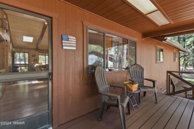 Charming single-level cabin in Pinetop Country Club, offering 1 on Pinetop Lakes Country Club in Arizona - for sale on GolfHomes.com, golf home, golf lot