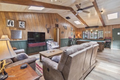 Charming single-level cabin in Pinetop Country Club, offering 1 on Pinetop Lakes Country Club in Arizona - for sale on GolfHomes.com, golf home, golf lot