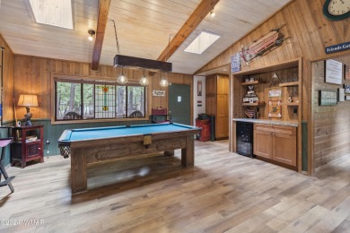 Charming single-level cabin in Pinetop Country Club, offering 1 on Pinetop Lakes Country Club in Arizona - for sale on GolfHomes.com, golf home, golf lot