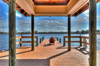 Luxurious 6 Bed, 4 Bath Pool and Spa Lake Access Dream-home on The Groves Golf and Country Club in Florida - for sale on GolfHomes.com, golf home, golf lot