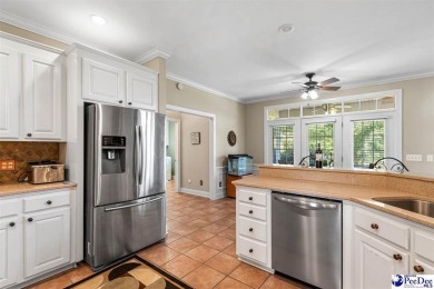 Welcome to 708 Muirfield Place, a stunning all-brick home on The Traces Golf Club in South Carolina - for sale on GolfHomes.com, golf home, golf lot