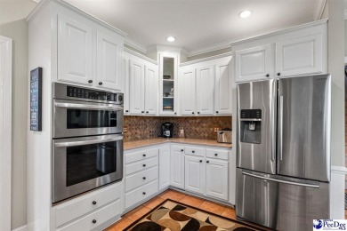 Welcome to 708 Muirfield Place, a stunning all-brick home on The Traces Golf Club in South Carolina - for sale on GolfHomes.com, golf home, golf lot