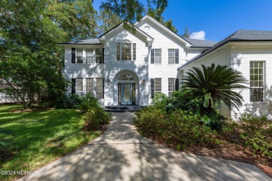 Welcome to your dream home in the sought-after Queens Harbour on Queens Harbour Yacht and Country Club in Florida - for sale on GolfHomes.com, golf home, golf lot