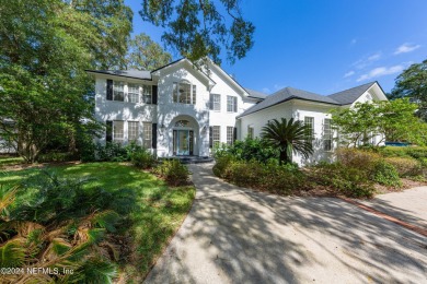 Welcome to your dream home in the sought-after Queens Harbour on Queens Harbour Yacht and Country Club in Florida - for sale on GolfHomes.com, golf home, golf lot