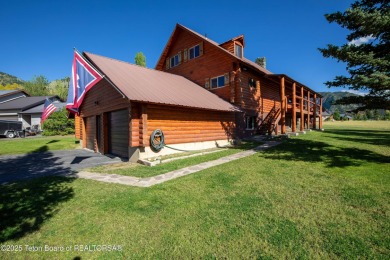 This beautiful log home combines rustic charm with modern on Star Valley RV Golf Course in Wyoming - for sale on GolfHomes.com, golf home, golf lot