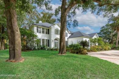 Welcome to your dream home in the sought-after Queens Harbour on Queens Harbour Yacht and Country Club in Florida - for sale on GolfHomes.com, golf home, golf lot