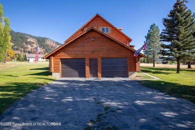 This beautiful log home combines rustic charm with modern on Star Valley RV Golf Course in Wyoming - for sale on GolfHomes.com, golf home, golf lot