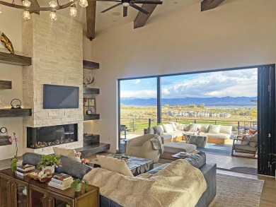Fall in love with this beautiful custom home in the sought-after on The Golf Club At Redlands Mesa in Colorado - for sale on GolfHomes.com, golf home, golf lot