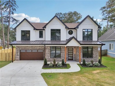 Experience modern luxury in this newly built custom farmhouse on East Lake Golf Club in Georgia - for sale on GolfHomes.com, golf home, golf lot