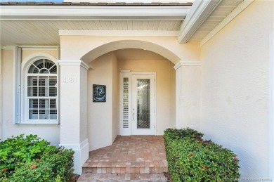 Awaken to golden sunrises glimmering across the lake and on  in Florida - for sale on GolfHomes.com, golf home, golf lot