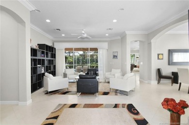 Awaken to golden sunrises glimmering across the lake and on  in Florida - for sale on GolfHomes.com, golf home, golf lot